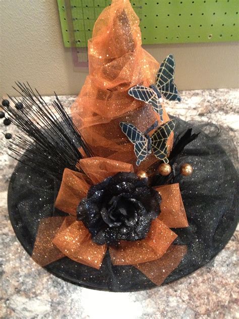 DIY dollar store witch hat wreath for a wickedly fun Halloween